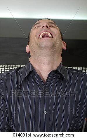 portrait of laughing young businessman View Large Photo Image Stock Image - portrait of laughing young businessman. Fotosearch