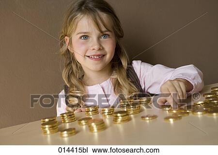 portrait of little girl with her savings View Large Photo Image Stock Image - portrait of little girl with her savings. Fotosearch