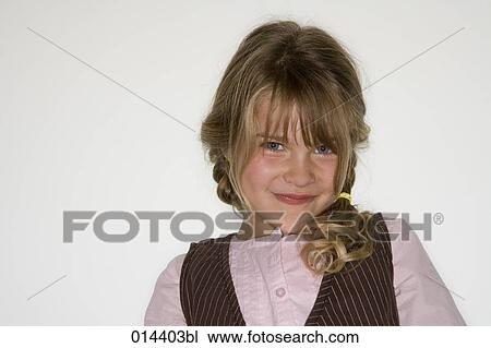 portrait of mischievous looking girl View Large Photo Image Stock Image - portrait of mischievous looking girl. Fotosearch