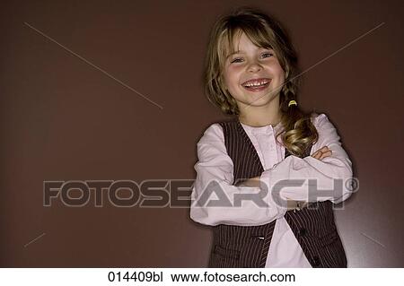 Stock Image - portrait of smiling cross-armed girl . Fotosearch