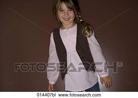 portrait of smiling young girl wearing waistcoat View Large Photo Image Stock Image - portrait of smiling young girl wearing waistcoat. Fotosearch