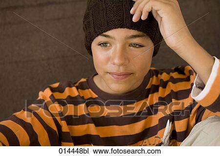 portrait of teenage boy with beanie View Large Photo Image Stock Image - portrait of teenage boy with beanie. Fotosearch