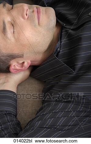 portrait of young man napping on the floor View Large Photo Image Stock Image - portrait of young man napping on the floor. Fotosearch