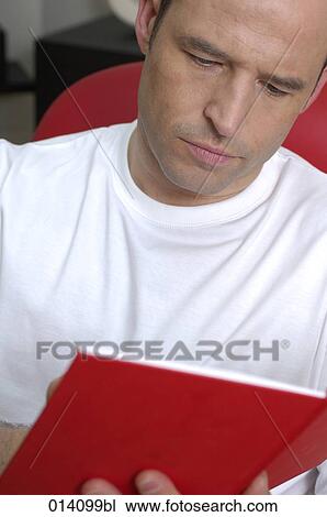 portrait of young writing in his journal View Large Photo Image Stock Image - portrait of young writing in his journal. Fotosearch