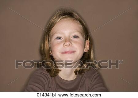 smiling girl in brown top looking at camera View Large Photo Image Stock Image - smiling girl in brown top looking at camera. Fotosearch