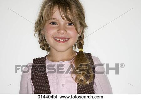 smiling girl with pigtails looking at camera View Large Photo Image Stock Image - smiling girl with pigtails looking at camera. Fotosearch