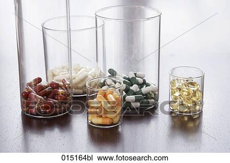 different pills and capsules in glass jars View Large Photo Image Stock Image - different pills and capsules in glass jars. Fotosearch