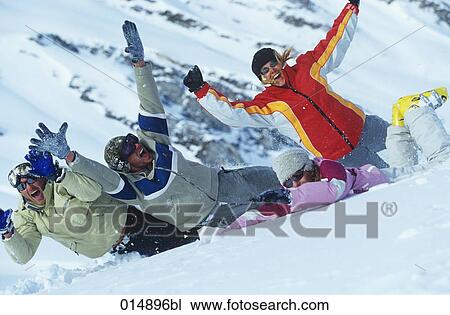 group of four friends having fun in snow together View Large Photo Image Stock Image - group of four friends having fun in snow together. Fotosearch