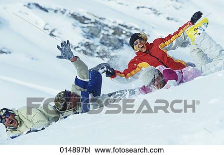 group of four friends having fun in snow together View Large Photo Image Stock Image - group of four friends having fun in snow together. Fotosearch