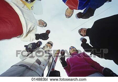 group of friends enjoying themselves in winter drinking mulled wine View Large Photo Image Stock Image - group of friends enjoying themselves in winter drinking mulled wine. Fotosearch