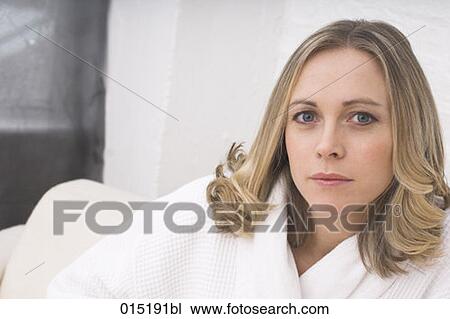 headshot of serious young woman in white bathrobe View Large Photo Image Stock Image - headshot of serious young woman in white bathrobe. Fotosearch