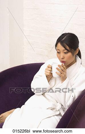 portrait of young japanese woman in bathrobe drinking some coffee View Large Photo Image Stock Image - portrait of young japanese woman in bathrobe drinking some coffee. Fotosearch