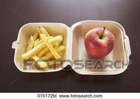 still lif of chips and apple in box View Large Photo Image Stock Image - still lif of chips and apple in box. Fotosearch