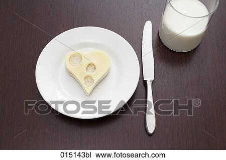 still life of cheese sandwich cut out in shape of heart on plate and glass of milk View Large Photo Image Stock Image - still life of cheese sandwich cut out in shape of heart on plate and glass of milk. Fotosearch