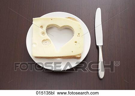 still life of cheese sandwich with cut out shape of heart on plate View Large Photo Image Stock Image - still life of cheese sandwich with cut out shape of heart on plate. Fotosearch