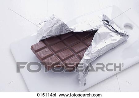 still life of chocolate wrapped in aluminium foil View Large Photo Image Stock Image - still life of chocolate wrapped in aluminium foil. Fotosearch