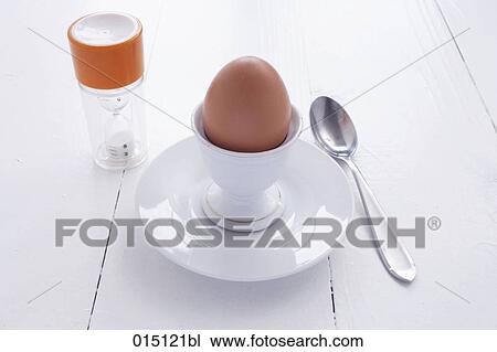 still life of egg in eggcup and egg timer View Large Photo Image Stock Image - still life of egg in eggcup and egg timer. Fotosearch