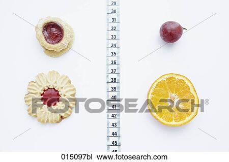 still life of pastries and fruits separated by tape measure View Large Photo Image Stock Image - still life of pastries and fruits separated by tape measure. Fotosearch