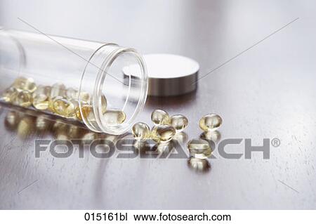 still life of pills coming out of medicine bottle View Large Photo Image Stock Image - still life of pills coming out of medicine bottle. Fotosearch