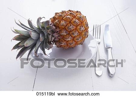 still life of pineapple on plate View Large Photo Image Stock Image - still life of pineapple on plate. Fotosearch