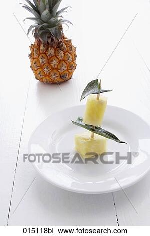 still life of pineapple pieces on plate View Large Photo Image Stock Image - still life of pineapple pieces on plate. Fotosearch
