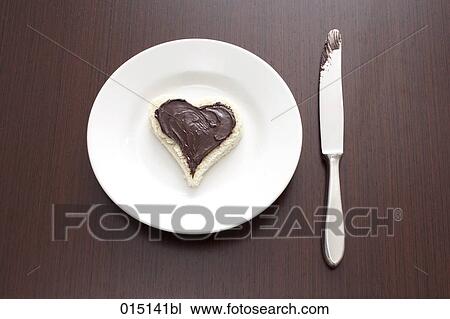 still life of sandwich with spread cut out in shape of heart on plate View Large Photo Image Stock Image - still life of sandwich with spread cut out in shape of heart on plate. Fotosearch