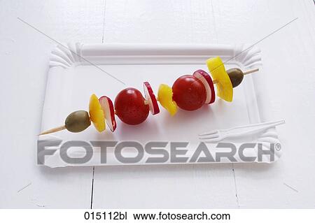 Stock Image - still life of shashlik consisting of different vegetables. Fotosearch