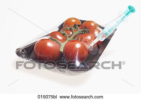still life of syringe injectiong tomatoes in packaging View Large Photo Image Stock Image - still life of syringe injectiong tomatoes in packaging. Fotosearch