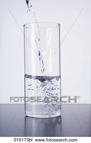 water being poured into glass View Large Photo Image Stock Image - water being poured into glass. Fotosearch