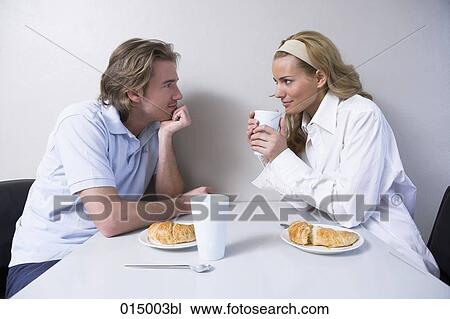 young couple having breakfast together View Large Photo Image Stock Image - young couple having breakfast together. Fotosearch