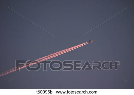 Airplane leaving vapour trail View Large Photo Image Stock Image - Airplane leaving vapour trail. Fotosearch