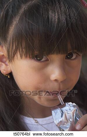 Asian girl drinking View Large Photo Image Stock Image - Asian girl drinking. Fotosearch