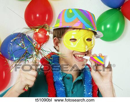 Boy at carnival party View Large Photo Image Stock Image - Boy at carnival party. Fotosearch