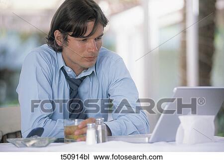 Buisnessman working with laptop View Large Photo Image Stock Image - Buisnessman working with laptop. Fotosearch