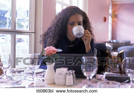 Businesswoman having breakfast View Large Photo Image Stock Image - Businesswoman having breakfast. Fotosearch