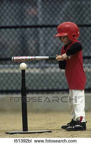 Child batting a tee ball View Large Photo Image Stock Image - Child batting a tee ball. Fotosearch