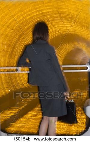China, Shanghai, Bund Tunnel, Business woman in tunnel View Large Photo Image Stock Image - China, Shanghai, Bund Tunnel, Business woman in tunnel. Fotosearch