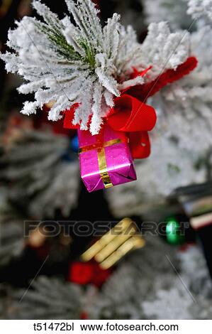 Stock Image - Christmas decorations on tree. Fotosearch