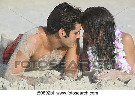 Stock Image - Close up of romantic couple. Fotosearch