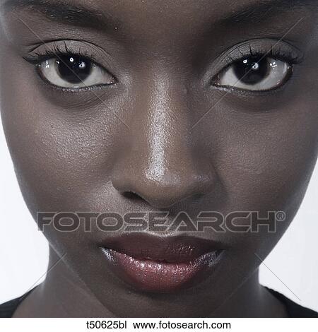 Stock Image - Close up of woman's face. Fotosearch
