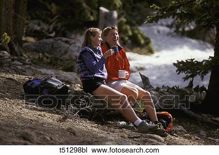 Couple hiking View Large Photo Image Stock Image - Couple hiking. Fotosearch