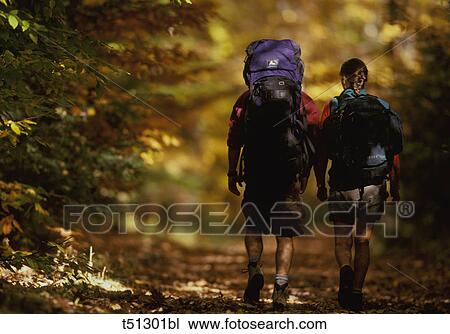 Couple hiking View Large Photo Image Stock Image - Couple hiking. Fotosearch