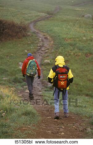 Couple hiking View Large Photo Image Stock Image - Couple hiking. Fotosearch