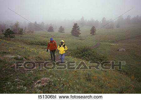 Couple hiking View Large Photo Image Stock Image - Couple hiking. Fotosearch