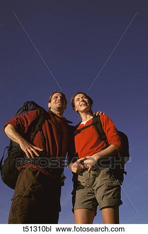 Couple hiking View Large Photo Image Stock Image - Couple hiking. Fotosearch