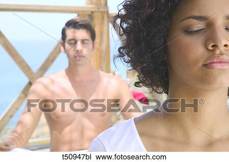 Couple's close up doing yoga View Large Photo Image Stock Image - Couple's close up doing yoga. Fotosearch