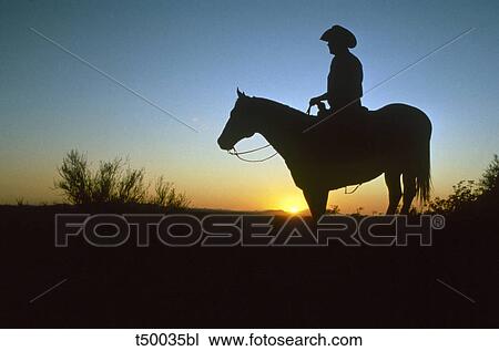 Cowboy on horseback at sunset View Large Photo Image Stock Image - Cowboy on horseback at sunset. Fotosearch