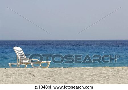 Deckchair on beach View Large Photo Image Stock Image - Deckchair on beach. Fotosearch