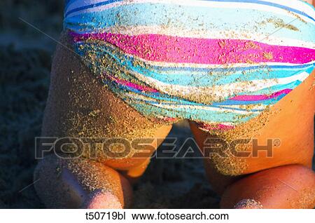 Detail of a girl in swimsuit View Large Photo Image Stock Image - Detail of a girl in swimsuit. Fotosearch