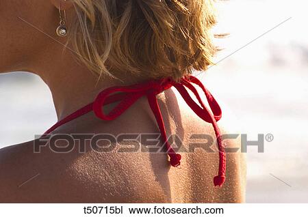 Detail of back's woman wearing swimsuit View Large Photo Image Stock Image - Detail of back's woman wearing swimsuit. Fotosearch